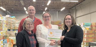 Lindsay-based non-profit food distribution organization Kawartha Lakes Food Source (KLFS) recently earned accreditation from Food Banks Canada. Pictured from left to right are past KLFS board chair Rose Barg, current KLFS board chair Kelland Sewell, KLFS executive director Heather Kirby, and Food Banks Canada representative Karen Alebon. (Photo courtesy of KLFS)