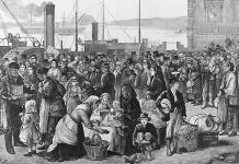 An 1874 engraving published in The Illustrated London News shows Irish emigrants preparing to leave the Queenstown port in County Cork, Ireland for North America. (Public domain image)