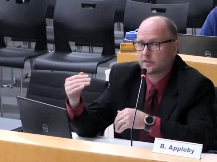 Brad Appleby, the City of Peterborough's director of planning, development and urban design, responds to a councillor's question about the proposed Strategic Land Acquisition and Conveyance Program during a city council meeting on January 27, 2025. (kawarthaNOW screenshot of City of Peterborough video)