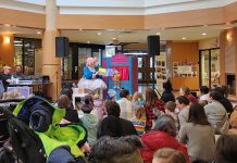 Families enjoying a reading by Betty Baker and Butch during Peterborough Family Literacy Day at Peterborough Square in January 2024. They will be returning to the free annual event at Peterborough Square on January 25, 2025. (Photo: Peterborough Family Literacy Day / Facebook)