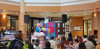 Families enjoying a reading by Betty Baker and Butch during Peterborough Family Literacy Day at Peterborough Square in January 2024. They will be returning to the free annual event at Peterborough Square on January 25, 2025. (Photo: Peterborough Family Literacy Day / Facebook)