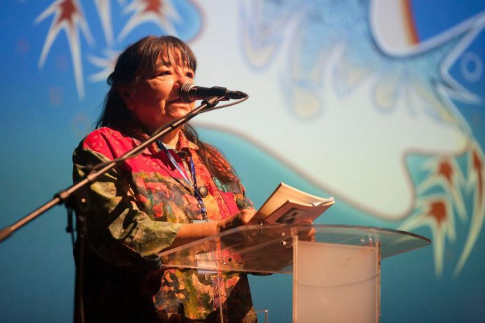 Anishinaabe artist Alice Olsen Williams speaks at the 2024 ReFrame Film Festival. She will once again be welcoming audiences at the opening night event to kick off the 2025 festival on Thursday, January 23 at Showplace Performance Centre in downtown Peterborough. (Photo: Esther Vincent, courtesy of ReFrame Film Festival)