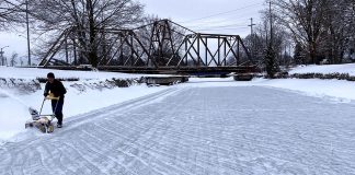 Some community members have been clearing snow from sections of the Trent Canal below the Peterborough Lift Lock so people can skate on the canal. Due to proposed cost-saving measures in the City of Peterborough's 2025 draft budget, city staff have not been maintaining the ice surface this winter. (Photo: Victoria Yeh)