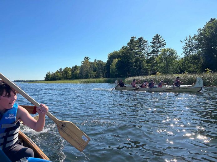 Some of the 20 First Nations and non-native youth who participated in the 2024 "Adventure in Understanding" 100-kilometre canoe journey. The annual program, organized by the Rotary Club of Peterborough Kawartha with the assistance of the Curve Lake First Nation Youth Committee and the co-operation of Camp Kawartha and the Canadian Canoe Museum, returns in 2025 from August 24 to 29. (Photo courtesy of Rotary Club of Peterborough Kawartha)