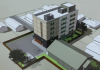 A rendering of Brock Mission's proposed 52-unit, six-storey co-ed transitional housing apartment building to be constructed at 738 Chemong Road in Peterborough, adjacent to the existing Cameron House women's shelter. (kawarthaNOW screenshot of City of Peterborough video)