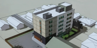 A rendering of Brock Mission's proposed 52-unit, six-storey co-ed transitional housing apartment building to be constructed at 738 Chemong Road in Peterborough, adjacent to the existing Cameron House women's shelter. (kawarthaNOW screenshot of City of Peterborough video)