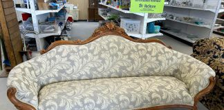 Habitat for Humanity Peterborough & Kawartha Region is transforming its Lakefield ReStore into a boutique-style store specializing in antiques, vintage treasures, and one-of-a-kind specialty items, such as this antique settee sofa that recently sold for $195. The Lakefield ReStore is also now the only ReStore in the region open on Sundays. (Photo: Lakefield ReStore / Facebook)