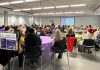 Community members at the Peterborough Public Library for the 2024 International Women's Day community event organized by the Kawartha World Issues Centre and the Kawartha Sexual Assault Centre. This year's free community event takes place from 12:30 to 4:30 p.m. at the library, following a rally and march that begins at 11:30 a.m. at Peterborough City Hall. The community event will include speakers, panellists, resources, performances, a kids' corner, and more. (Photo courtesy of Kawartha World Issues Centre)