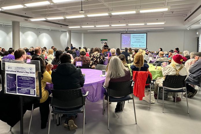 Community members at the Peterborough Public Library for the 2024 International Women's Day community event organized by the Kawartha World Issues Centre and the Kawartha Sexual Assault Centre. This year's free community event takes place from 12:30 to 4:30 p.m. at the library, following a rally and march that begins at 11:30 a.m. at Peterborough City Hall. The community event will include speakers, panellists, resources, performances, a kids' corner, and more. (Photo courtesy of Kawartha World Issues Centre)