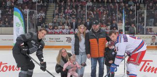 Five Counties Children's Centre client Nova (in pink) took part in the ceremonial pre-game puck drop with her family at the "Next Gen Game" at the Peterborough Memorial Centre on February 17, 2025, when the Peterborough Petes took on the Kitchener Rangers. Not only did the Petes win the game, but the annual fundraising event brought in $17,056 for Five Counties. (Photo courtesy of Peterborough Petes)