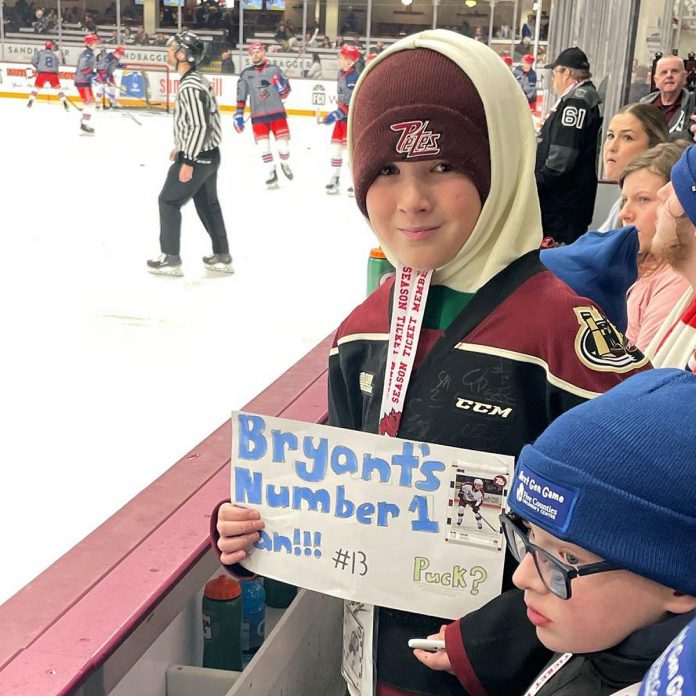 Five Counties Children's Centre client Bryor had the number of his favourite Peterborough Pete, forward Gavin Bryant, on display at at the "Next Gen Game" at the Peterborough Memorial Centre on February 17, 2025, when the Petes took on the Kitchener Rangers. Bryor was one of several Five Counties clients to watch the team's pre-game warmup and take part in a behind-the-scenes experience. (Photo courtesy of Five Counties Children's Centre)