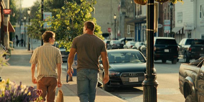 Richard Beck (Johnny Berchtold) and Jack Reacher (Alan Ritchson) walk down King Street in downtown Millbrook in a scene from the third episode of the third season of the action-thriller series "Reacher" streaming now on Amazon Prime Video. (kawarthaNOW screenshot)