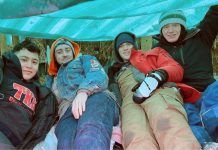 Members of the Peterborough chapter of Tau Kappa Epsilon (TKE) student fraternity camping out for 48 hours at a previous "TKE in a Box" fundraiser. The annual event returns for its 14th year from February 7 to 9, 2025 in the parking lot of the Venture North building in downtown Peterborough, raising awareness about the need for affordable housing and funds for Habitat for Humanity Peterborough & Kawartha Region. (Photo: Tau Kappa Epsilon)