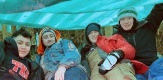 Members of the Peterborough chapter of Tau Kappa Epsilon (TKE) student fraternity camping out for 48 hours at a previous "TKE in a Box" fundraiser. The annual event returns for its 14th year from February 7 to 9, 2025 in the parking lot of the Venture North building in downtown Peterborough, raising awareness about the need for affordable housing and funds for Habitat for Humanity Peterborough & Kawartha Region. (Photo: Tau Kappa Epsilon)