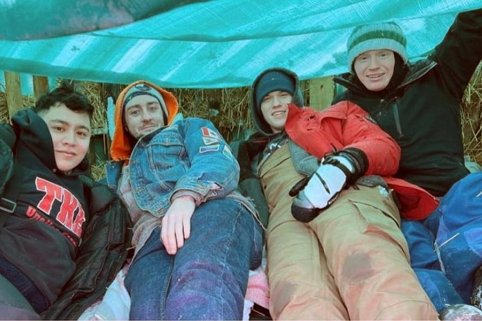 Members of the Peterborough chapter of Tau Kappa Epsilon (TKE) student fraternity camping out for 48 hours at a previous "TKE in a Box" fundraiser. The annual event returns for its 14th year from February 7 to 9, 2025 in the parking lot of the Venture North building in downtown Peterborough, raising awareness about the need for affordable housing and funds for Habitat for Humanity Peterborough & Kawartha Region. (Photo: Tau Kappa Epsilon)