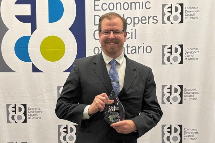 The Town of Cobourg's economic development manager Daniel Van Kampen with the Economic Developers Council of Ontario award for workforce development and talent attraction in the rural category. (Photo: Town of Cobourg)