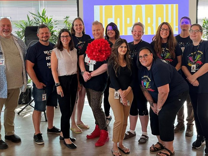 Thanks to the generosity of individual community members and local workplaces, the United Way Peterborough & District is only $117,000 away from meeting its 2024-25 campaign goal of raising $1.5 million by March 31, 2025. Pictured is are members of GM Financial in Peterborough, which raised $38,795 for the United Way through its workplace campaign, including through fun events such as Jeopardy. (Photo: United Way Peterborough & District)