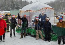 Youth of the 1st Bancroft Scouting Group at the 2024 Bancroft Santa Claus Parade where they donned homemade mini-canoes as a part of their floats. They will be using those canoes again as the Winter Carnaval event they are hosting at Big Rock Eco Retreat in Addington Highlands on March 22, 2025. A part of the Scouts Canada National Challenge, the family-friendly afternoon will include outdoor games, demonstration, tasty treats, music, and more. (Photo courtesy of 1st Bancroft Scouting Group)