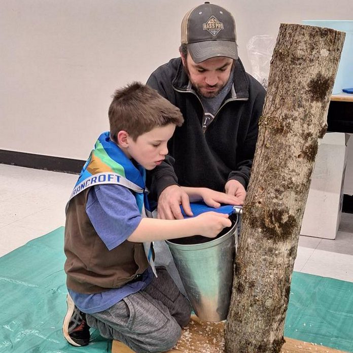 Youth in the 1st Bancroft Scouting Group learned how to tap a maple tree, boil down the sap, and make maple taffy during the second challenge in the Scouts Canada National Challenge. Member of the community can try making maple taffy during the Winter Carnaval event at Big Rock Eco Retreat in Addington Highlands on March 22, 2025. (Photo courtesy of 1st Bancroft Scouting Group)