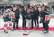 The "Battle of the Badges" charity hockey game held on March 1, 2025 in Cobourg raised more than $9,000 for Big Brothers Big Sisters of South-West Durham and Northumberland. Cobourg firefighters defeated Cobourg police officers 6-3 and were presented with the Chris Garrett Memorial Trophy. (Photo: Town of Cobourg / Facebook)