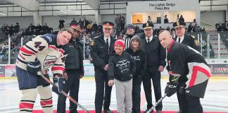 The "Battle of the Badges" charity hockey game held on March 1, 2025 in Cobourg raised more than $9,000 for Big Brothers Big Sisters of South-West Durham and Northumberland. Cobourg firefighters defeated Cobourg police officers 6-3 and were presented with the Chris Garrett Memorial Trophy. (Photo: Town of Cobourg / Facebook)