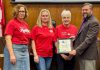 Municipality of Brighton Applefest committee members joined members of Brighton council, including Mayor Brian Ostrander (right) during a Municipality of Brighton council meeting on March 3, 2025 to celebrate Brighton's Applefest being recognized as one of the "Top 100" festivals for 2025 from Festival & Events Ontario. (Photo: Municipality of Brighton)