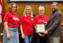 Municipality of Brighton Applefest committee members joined members of Brighton council, including Mayor Brian Ostrander (right) during a Municipality of Brighton council meeting on March 3, 2025 to celebrate Brighton's Applefest being recognized as one of the "Top 100" festivals for 2025 from Festival & Events Ontario. (Photo: Municipality of Brighton)