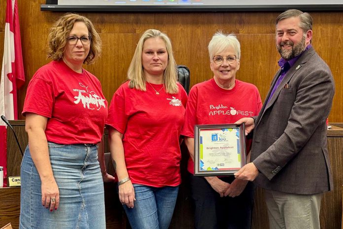 Municipality of Brighton Applefest committee members joined members of Brighton council, including Mayor Brian Ostrander (right) during a Municipality of Brighton council meeting on March 3, 2025 to celebrate Brighton's Applefest being recognized as one of the "Top 100" festivals for 2025 from Festival & Events Ontario. (Photo: Municipality of Brighton)