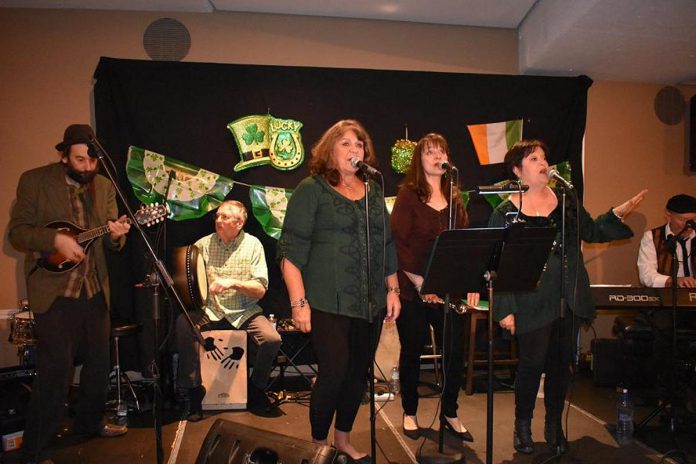 Fiddlin' Jay Edmunds, Ron Kervin, and 4 Front (Theresa Foley, Sheila Prophet, Norma Curtis, and Terry Finn) performing at Foley's Irish Pub in 2018. (Photo courtesy of Theresa Foley)