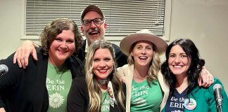 Musicians Kate Brioux, Paul Crough, Kate Suhr, Melissa Payne, and emcee Megan Murphy sport matching shirts reading "Be the Erin," as in "Be the Erin you want to see in the world," at a kitchen party fundraiser in honour of the late Erin Sullivan in March 2024. The second annual event, from which all proceeds go towards the mortgage of a home in Sullivan's name that houses people coming out of homelessness, will be held on March 14, 2025, at the Ennismore Community Centre. (Photo courtesy of Jessica Carroll)