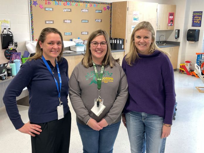 The work that Five Counties staff do in local schools is meant to assist educators and support student learning, as (from left) Five Counties occupational therapy assistant Emily Vann, St. Joseph's special education resource teacher Sinead McIlwain, and Five Counties occupational therapist Katy Morton can all attest. (Photo courtesy of Five Counties)