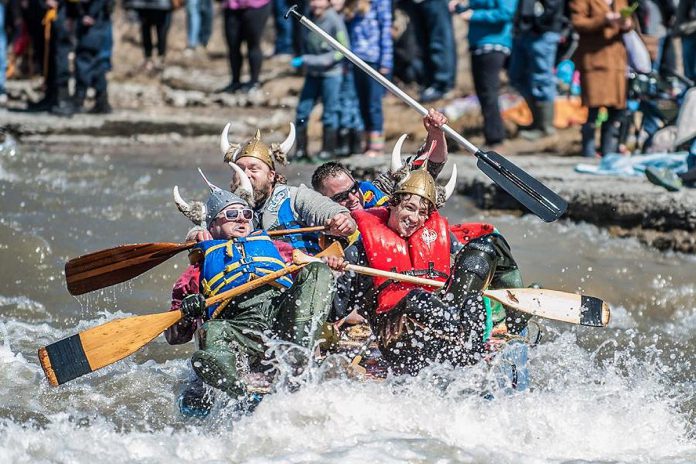 A team paddling their makeshift watercraft battles the current of the Ganaraska River during the 2018 "Float Your Fanny Down the Ganny" race in Port Hope. The 2025 event on Saturday, April 12 will see the return of the beloved Crazy Craft race, where participants build a raft out of any combination of items. This year's event also includes a new floaty category that was scheduled to make its debut last year but was cancelled due to inclement weather. (Photo: Walton St. Photography)