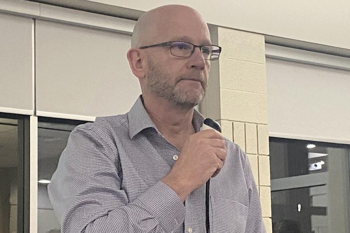 Friends of Bonnerworth Park director John Gerelus provided the community with an update at a meeting at St. Peter Catholic Secondary School on March 5, 2025. (Photo: Paul Rellinger / kawarthaNOW)