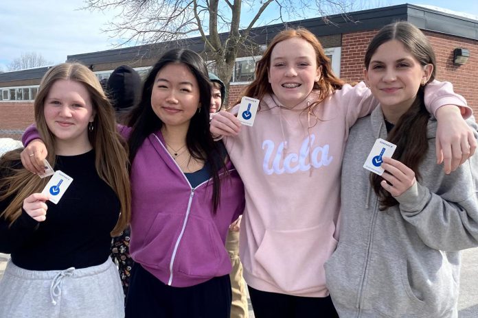 Senior elementary school students are excited to travel by transit with their friends over March Break and visit local destinations listed on their Grade 8 Transit Quest passports. The Grade 8 Transit Quest program helps students learn independence and gain confidence while encouraging future use of public transit. (Photo: Natalie Stephenson / GreenUP)