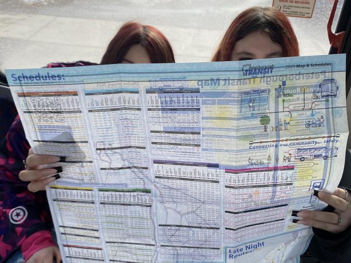 Students learn how to plan their route using a printed Peterborough Transit map, one of several resources available through the Grade 8 Transit Quest program to support them as they plan their journey by transit. (Photo: Natalie Stephenson / GreenUP)