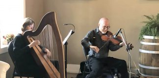 Harpist Tanah Haney and fiddler John Hoffman will perform as the Celtic duo Banish Misfortune at a family-friendly St. Patrick's Day Kitchen Party at Camp Kawartha Environment Centre on March 15, 2025. The vocal trio Hardwood Cat and Irish traditional quartet The Skelligs will also perform. (Photo courtesy of John Hoffman)