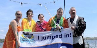 Kawartha Lakes real estate sales representives Dean Michel (right) and Jennifer Bacon (left) and their family after plunging into Balsam Lake for the Jump in the Lake Challenge on May 4, 2024. The 6th annual challenge, which encourages Coboconk-area residents to take to take a cold plunge into their local lake for a good cause, is being held on May 3, 2025 with the goal of raising $20,000 towards the Coboconk & Area Food Bank. (Photo courtesy of Dean Michel)