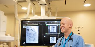Dr. Warren Ball, interventional cardiologist and head of cardiology at Peterborough Regional Health Centre (PRHC), led a media tour of the hospital's upgraded cardiac catheterization laboratory on March 25, 2025, where he gave demonstrations of the state-of-the-art tools available in the cath lab's two suites while highlighting how essential the advancements are to patient care. The upgrades, which provide life-saving minimally invasive cardiac stenting and diagnosis for patients with heart disease, were funded through $3.55 million in community donations to the PRHC Foundation's $60-million Campaign for PRHC. (Photo: Jordan Lyall Photography / kawarthaNOW)