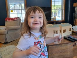 Two-year-old Emira is all smiles, as she enjoys a lighter moment at home. The little girl is benefiting from Five Counties services, and her mom Haidyn credits staff at the regional child treatment centre with giving the family confidence along the way. (Photo courtesy of Five Counties)