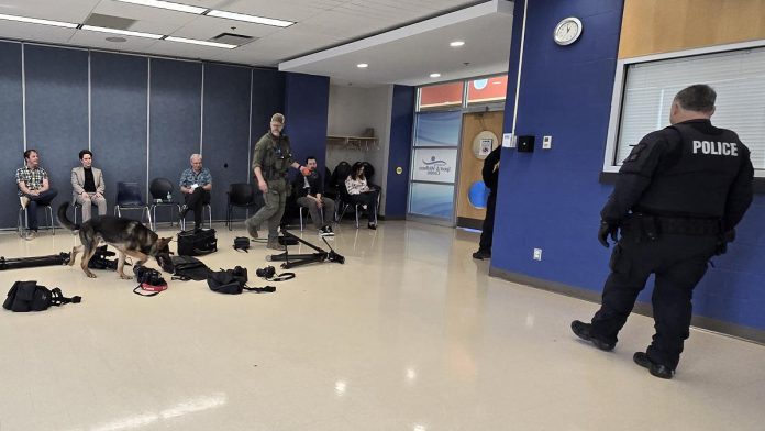 The RCMP conducted a security sweep of media equipment prior to a rally featuring federal Liberal leader and prime minister Mark Carney at the Peterborough Sport & Wellness Centre on April 19, 2025. (Photo: Jeannine Taylor / kawarthaNOW)