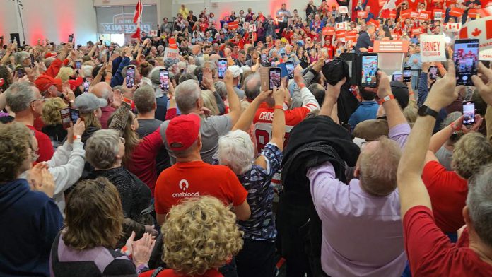 Federal Liberal leader and prime minister Mark Carney hugged Peterborough candidate Emma Harrison at a rally at the Peterborough Sport & Wellness Centre on April 19, 2025. (Photo: Jeannine Taylor / kawarthaNOW)
