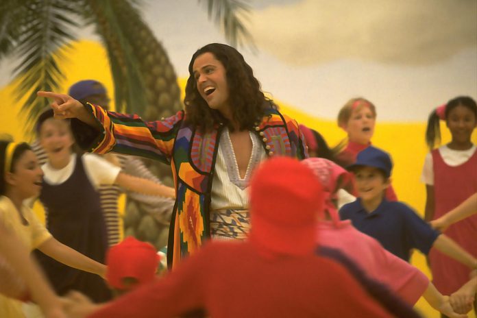 Donny Osmond as Joseph in a scene from the 1999 film version of "Joseph and the Amazing Technicolor Dreamcoat", an adaption of the 1972 stage musical by Andrew Lloyd Webber and lyrics by Tim Rice, based on the character of Joseph from the Bible's Book of Genesis, which was first staged on Broadway in 1982. (Photo via IMDb)