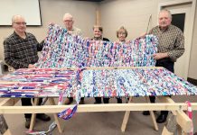 Volunteers of Calvary Pentecostal Church in Peterborough meet for two hours every week to transform plastic milk bags into sleeping mats for the local unhoused population, using two looms built by church group organizer Tim Young. Now, through Clean Up Peterborough, businesses and organizations can sponsor the build of a loom to provide more opportunity for volunteer groups to create sleeping mats. (Photo: Street Level Advocacy / Facebook)