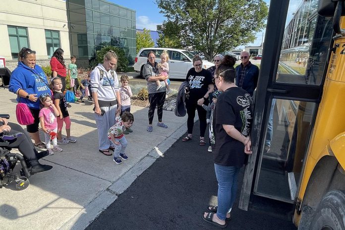 Families attending Five Counties Children's Centre's 'Ready for School' event in Cobourg in August 2024 prepare to board a school bus to see what the ride entails. Offering supports for children who may face greater challenges due to physical, developmental, or communication needs, the events are returning in Peterborough, Cobourg, and Lindsay in spring 2025 to provide families with even more time to prepare. (Photo: Five Counties) Families attending Five Counties Children's Centre's 'Ready for School' event in Cobourg in August 2024 prepare to board a school bus to see what the ride entails. Offering supports for children who may face greater challenges due to physical, developmental, or communication needs, the events are returning in Peterborough, Cobourg, and Lindsay in spring 2025 to provide families with even more time to prepare. (Photo: Five Counties)