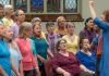 AbZolutely Choir Peterborough-Kawartha artistic director and founder Abby Zolz (right) leads the choir in a performance with purpose during their 2024 year-end concert, which was a fundraiser for One City Peterborough. The group has chosen GreenUP to benefit from their 2025 year-end concert happening Monday, May 26 at Murray Street Baptist Church in Peterborough. (Photo: Ian MacCready)