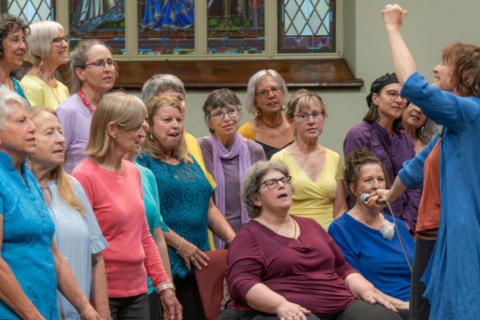 AbZolutely Choir Peterborough-Kawartha artistic director and founder Abby Zolz (right) leads the choir in a performance with purpose during their 2024 year-end concert, which was a fundraiser for One City Peterborough. The group has chosen GreenUP to benefit from their 2025 year-end concert happening Monday, May 26 at Murray Street Baptist Church in Peterborough. (Photo: Ian MacCready) AbZolutely Choir Peterborough-Kawartha artistic director and founder Abby Zolz (right) leads the choir in a performance with purpose during their 2024 year-end concert, which was a fundraiser for One City Peterborough. The group has chosen GreenUP to benefit from their 2025 year-end concert happening Monday, May 26 at Murray Street Baptist Church in Peterborough. (Photo: Ian MacCready)