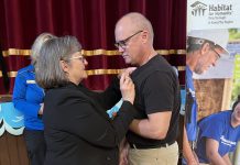 Susan Zambonin, CEO of Habitat for Humanity Peterborough & Kawartha Region (Habitat PKR), presented Lindsay ReStore volunteer Kevin Deuchars with the King Charles III Coronation Medal at a special volunteer celebration hosted at Omemee Coronation Hall on April 30, 2025 during National Volunteer Week. (Photo: Habitat PKR)