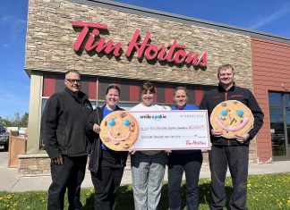 Meaghan Chapman (second from left) and Nick Chapman (right), along with operations manager and general manager Mark and Nancy Hutchinson (left and second from right), presented a cheque for $21,066.55 to Ross Memorial Hospital (RMH) Foundation board chair Mona Malcolm Sharman (middle) on May 20, 2025, representing proceeds from the Tim Hortons Smile Cookie campaign held at Chapmans' five Tim Hortons locations in Lindsay from April 28 to May 4. (Photo: RMH Foundation)