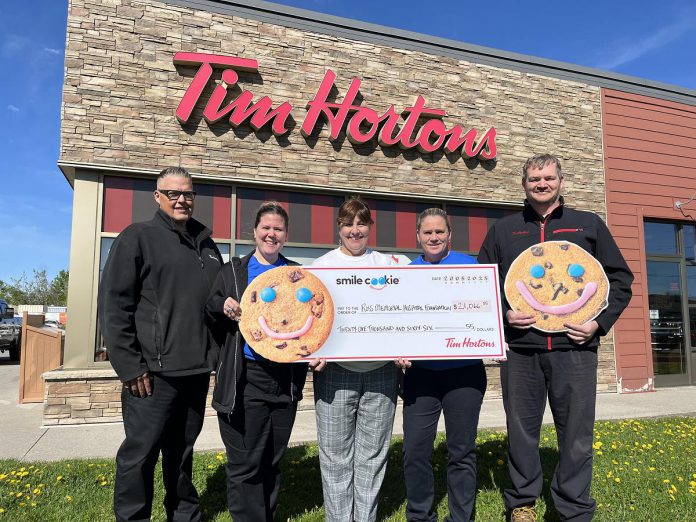 Meaghan Chapman (second from left) and Nick Chapman (right), along with operations manager and general manager Mark and Nancy Hutchinson (left and second from right), presented a cheque for $21,066.55 to Ross Memorial Hospital (RMH) Foundation board chair Mona Malcolm Sharman (middle) on May 20, 2025, representing proceeds from the Tim Hortons Smile Cookie campaign held at Chapmans' five Tim Hortons locations in Lindsay from April 28 to May 4. (Photo: RMH Foundation) Meaghan Chapman (second from left) and Nick Chapman (right), along with operations manager and general manager Mark and Nancy Hutchinson (left and second from right), presented a cheque for $21,066.55 to Ross Memorial Hospital (RMH) Foundation board chair Mona Malcolm Sharman (middle) on May 20, 2025, representing proceeds from the Tim Hortons Smile Cookie campaign held at Chapmans' five Tim Hortons locations in Lindsay from April 28 to May 4. (Photo: RMH Foundation)