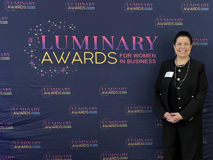 kawarthaNOW founder, CEO, and publisher Jeannine Taylor at the Peterborough and Kawarthas Chamber of Commerce's inaugural Luminary Awards celebration at the Great Hall of Trent University's Champlain College on May 8, 2025. (Photo: Deborah Berrill)